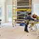 Workers remodeling inside of a house